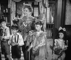 ALFRED HITCHCOCK PRESENTS with sister Angela. I held the snake and she had the tadpoles in a jar