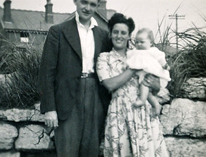 Here I am with my parents in England before we immigrated to America.